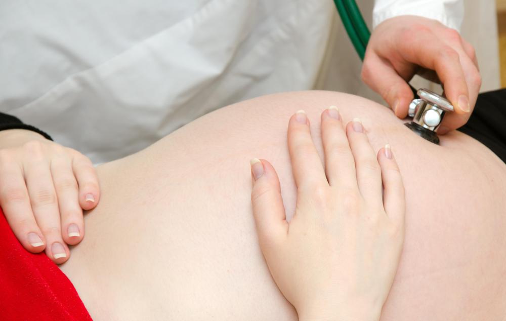 A midwife often works closely with an obstetrician.