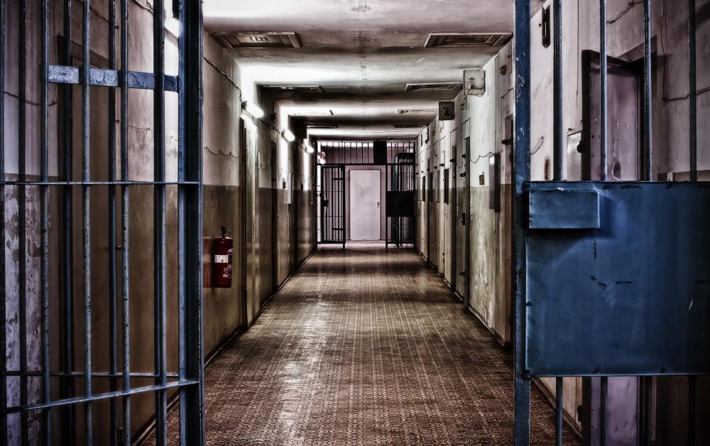 People who are being held in jail are called inmates.