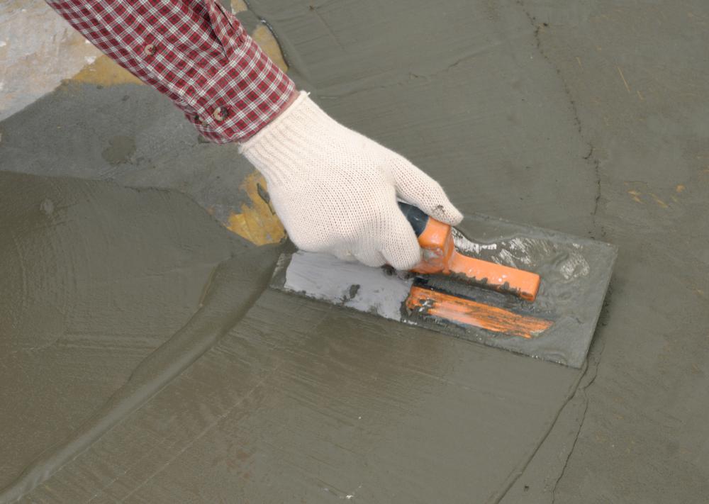 Properly poured concrete being worked.