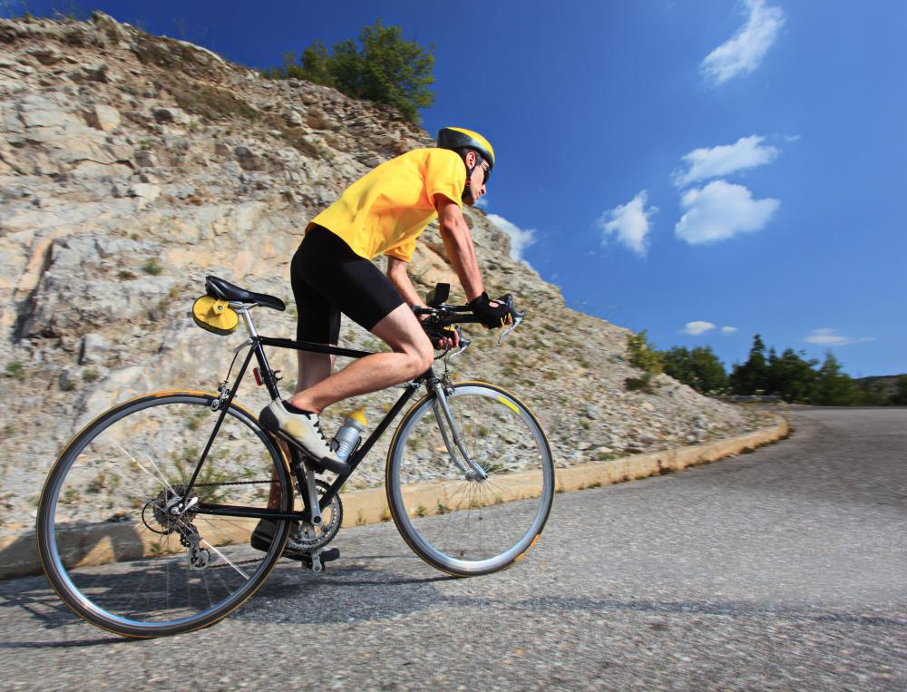 Road cyclist wearing compression shorts.