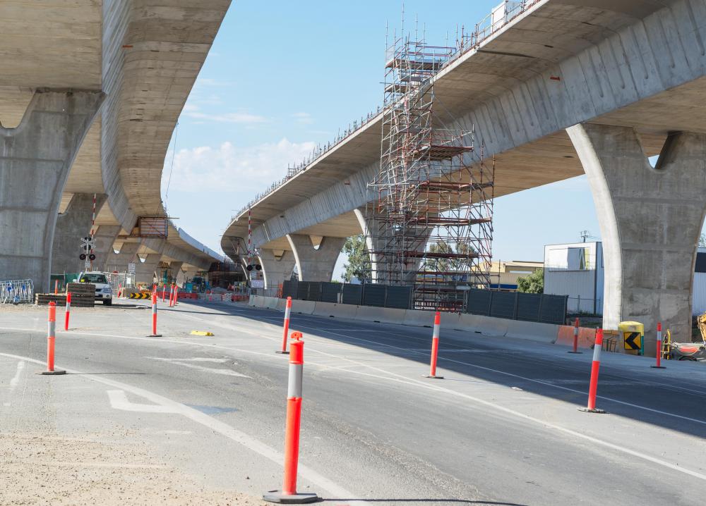 Civil engineers work alongside urban planners and design roads for urban areas.
