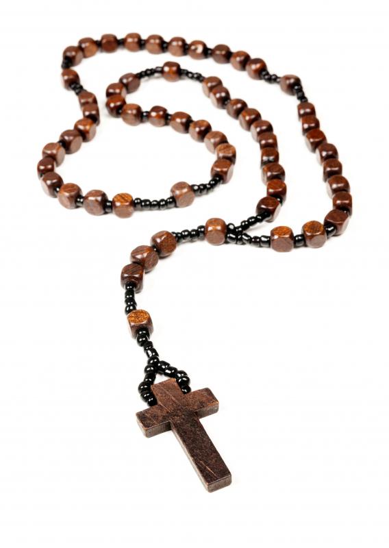 Some Catholics wear rosaries blessed by bishops as a form of a good luck charm.