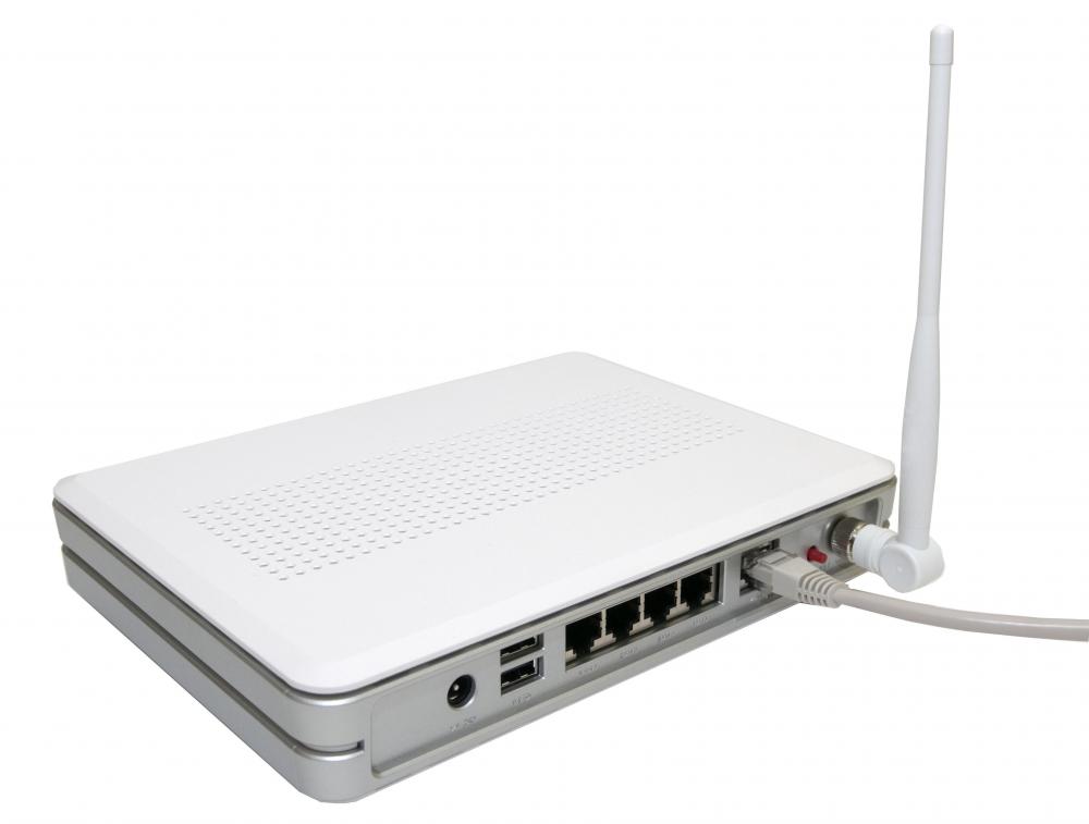 A wireless router can communicate with a computer that has a WLAN USB dongle.