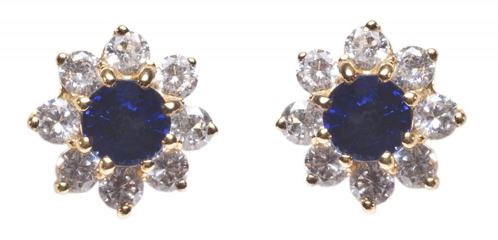 Earrings made of sapphires, diamonds, and gold are considered fine jewelry.