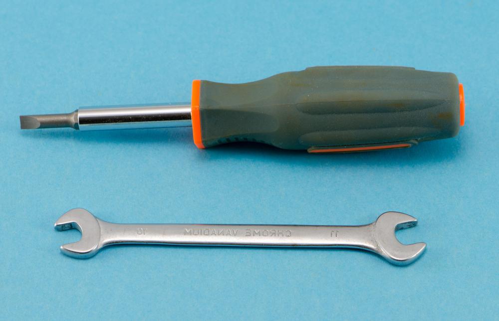 Screwdriver and wrench.