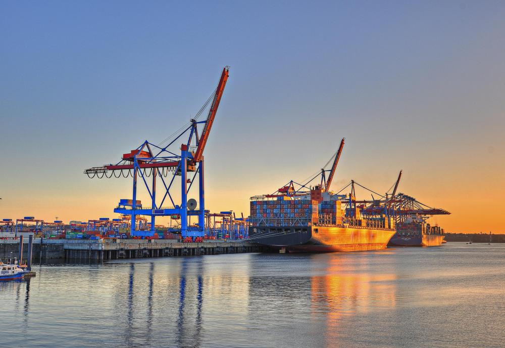 Freight transport includes moving goods from one place to another, often by sea or air.