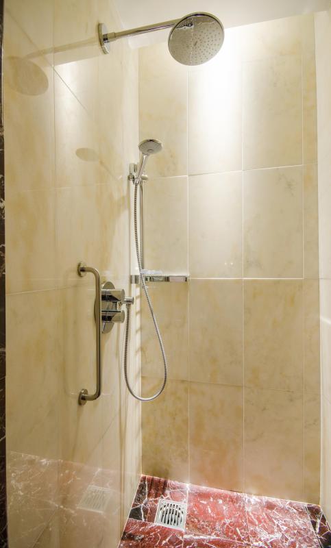 Wet walls may be used to house plumbing for a new shower.