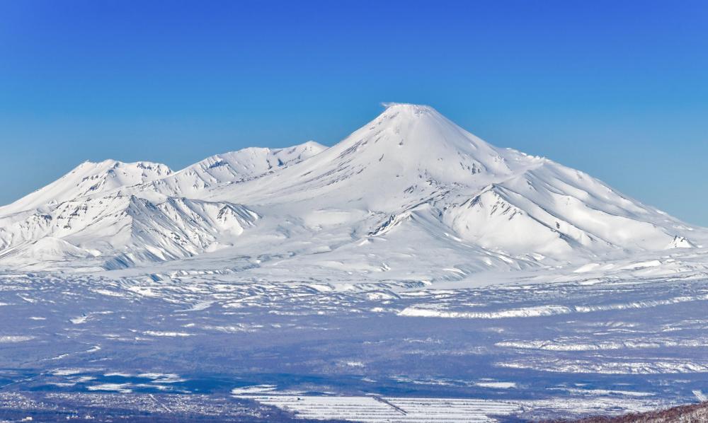 The Earth's magnetic field is strongest near the magnetic poles, such as in Siberia.