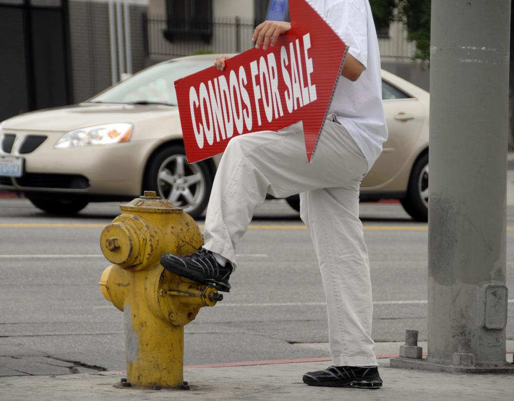 Sign spinners on street corners is one way businesses can cut through the advertising clutter.