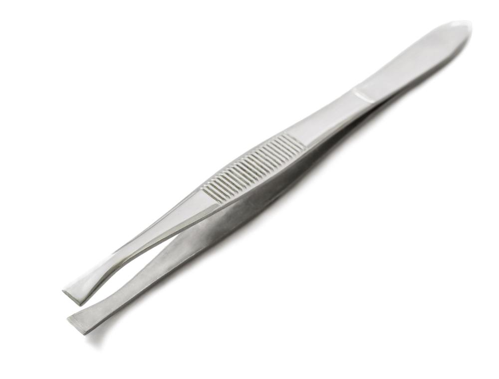 Tweezers may be used to papercraft.