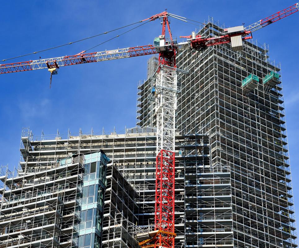 Most skyscrapers use steel for their roof beam construction.
