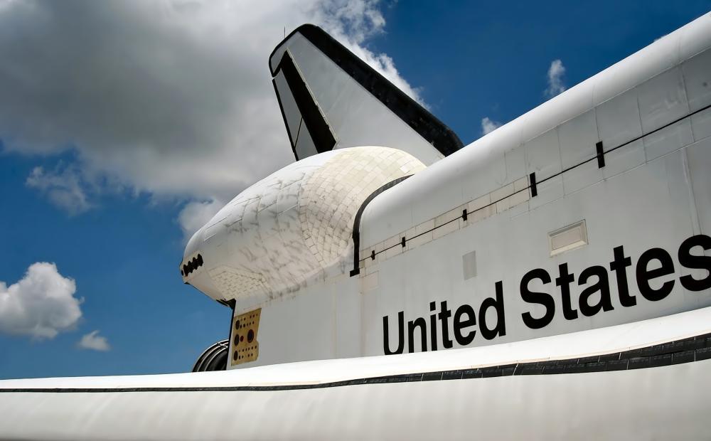 The need to occasionally replace a Space Shuttle's external tiles added to its launch costs.