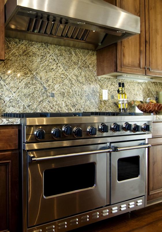 A luxurious cooking appliance is typically featured in a gourmet kitchen.