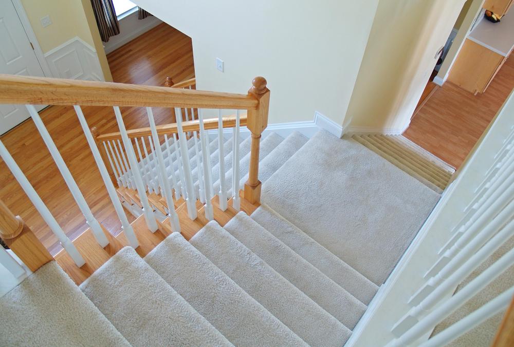 Padding glue may be used to install carpet on stairs.
