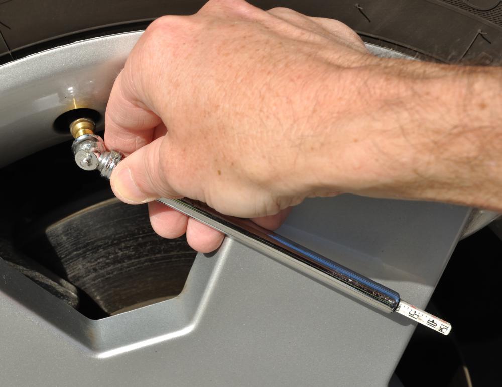 A stick-type tire air pressure gauge.