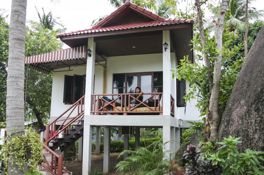 Stilt houses are sometimes built on land.