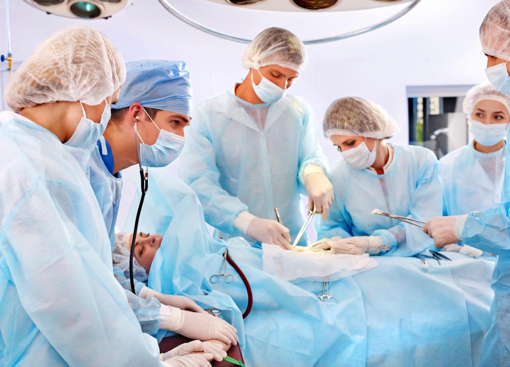 Stage 2 ovarian cancer treatment may begin with surgery to remove the ovaries.