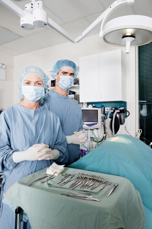 Forceps, scalpels, and other instruments are used in typical surgical procedures.