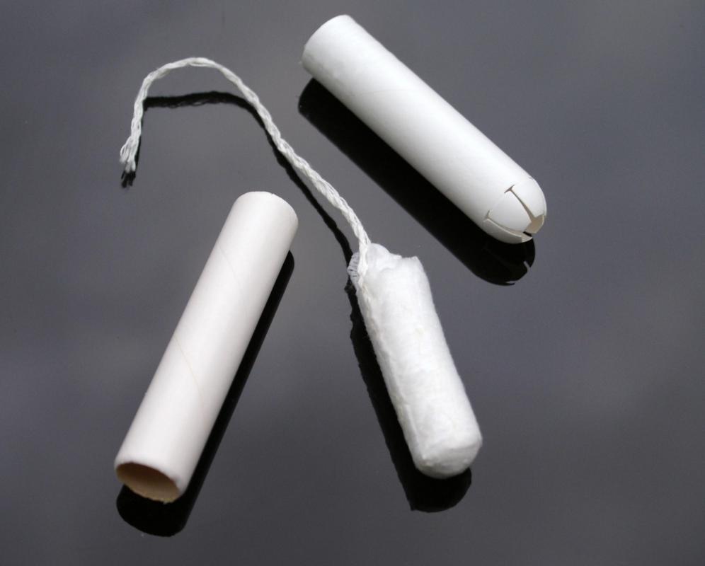 The barrel of a colonic speculum slightly resembles a tampon applicator.