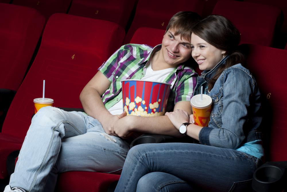 A date will usually involve visiting a place, such as a movie theater, that is not related to work.