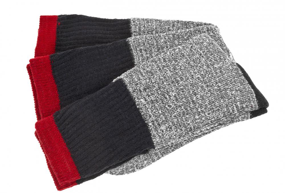 Wearing thick socks protects feet in very cold environments.