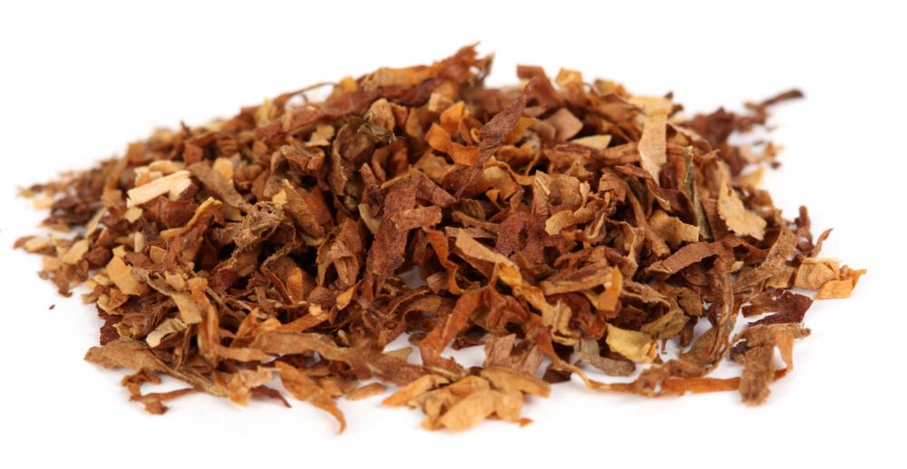 Plug tobacco is combined with sweeteners and then pressed into blocks.