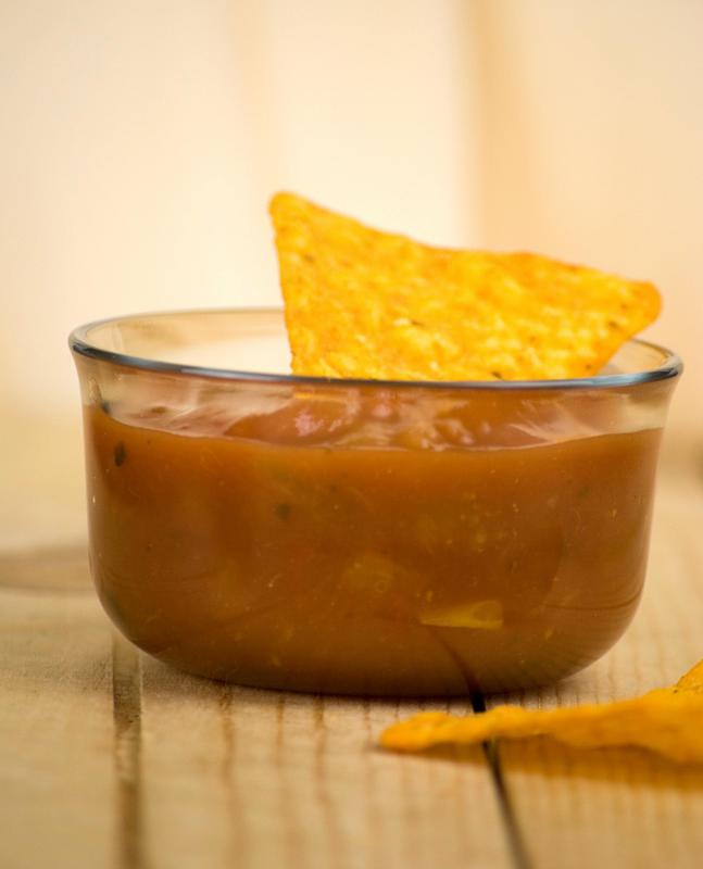 Trauma caused by sharp foods, such as tortilla chips, may cause a canker sore in the throat.