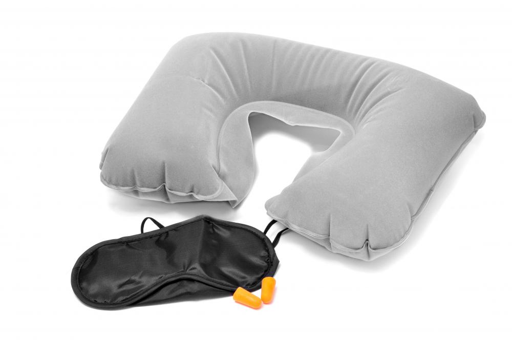 An airplane travel kit may include a blow up neck pillow, ear plugs and a sleeping mask.