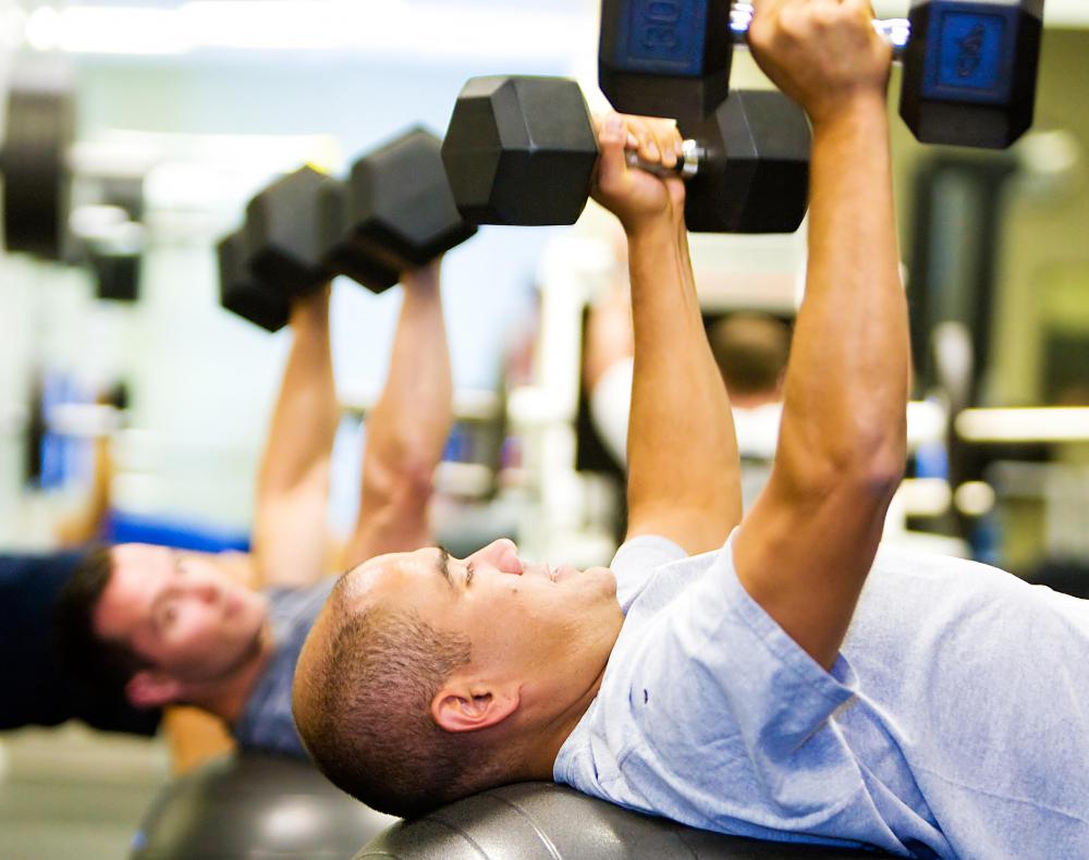 Chest presses with dumbbells can be used to strengthen the pectoral muscles.