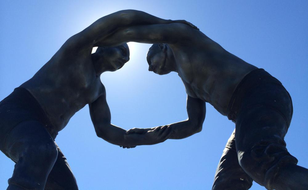 Men in a bromance may engage in affectionate wrestling.
