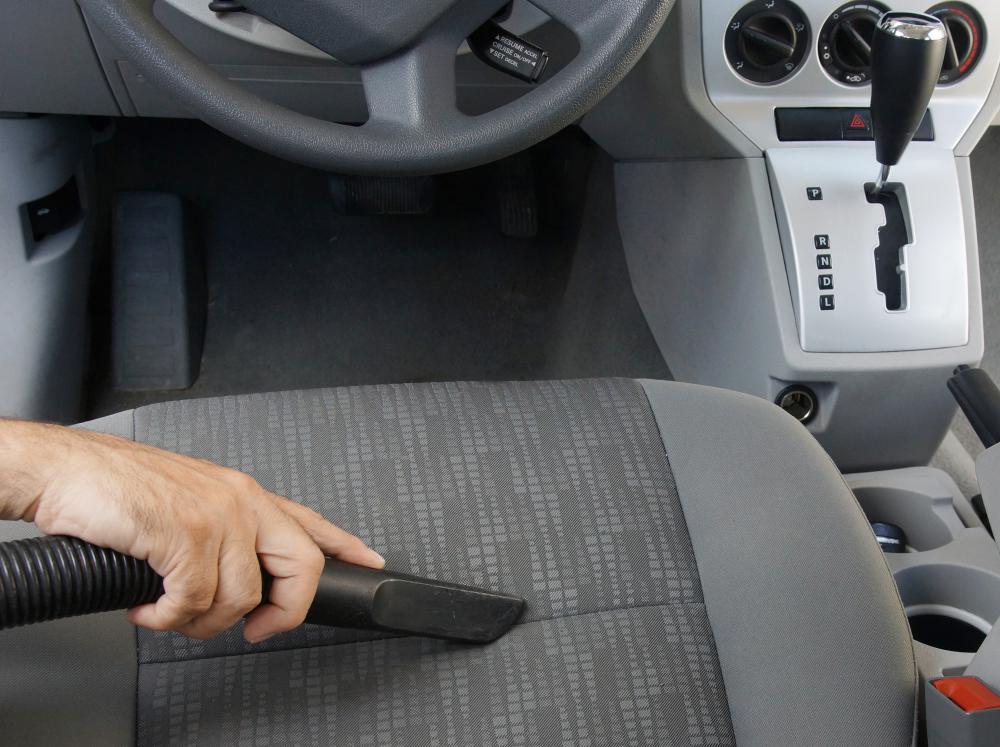 Vehicle interiors have upholstery on the seats.
