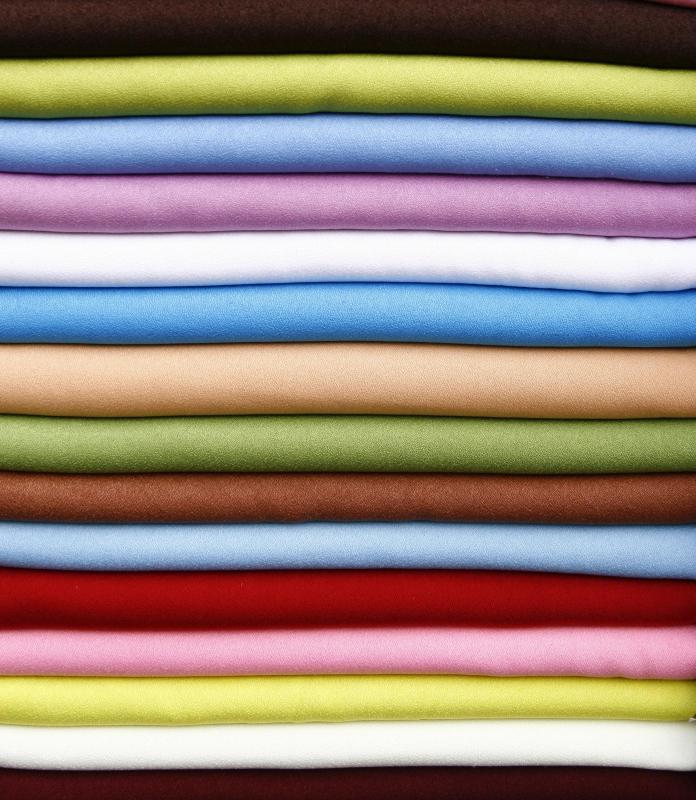 Metallic fibers are added to knit fabric to create lamé.