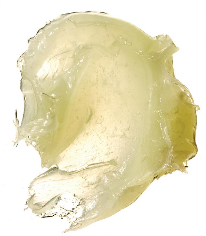 Petroleum jelly, which can be used to protect the skin around the hairline from texturizing chemicals.