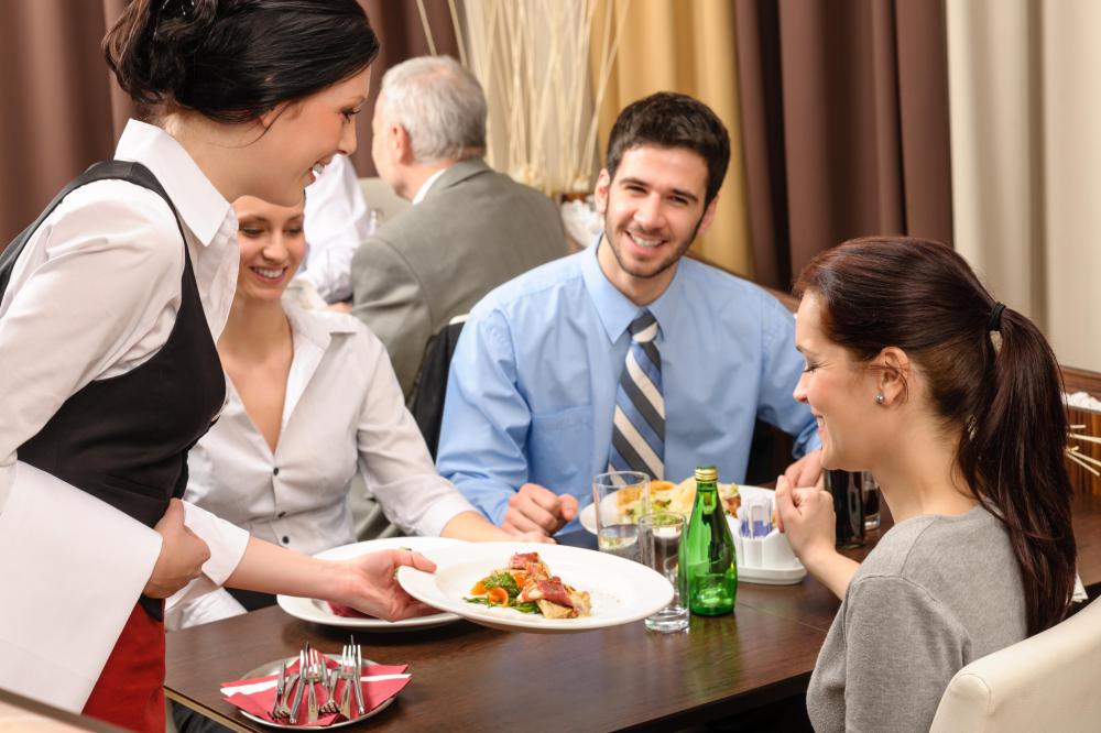 A restaurant serves food, both goods and services.