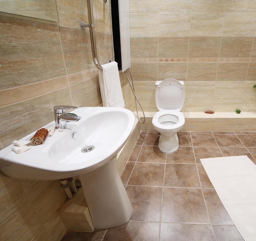 Water closet with sink.