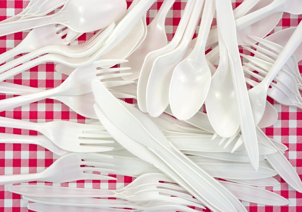 Plastic forks, knives, and spoons.