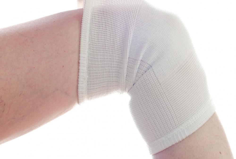 Elastic knee supports that are pulled over the knee may be used to compress a swollen knee.