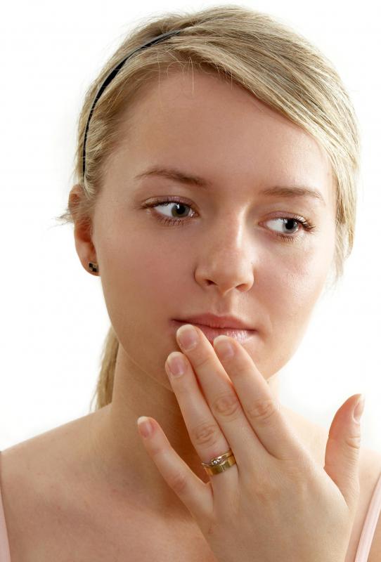 Lip gloss can help to make lips look smoother and shinier.