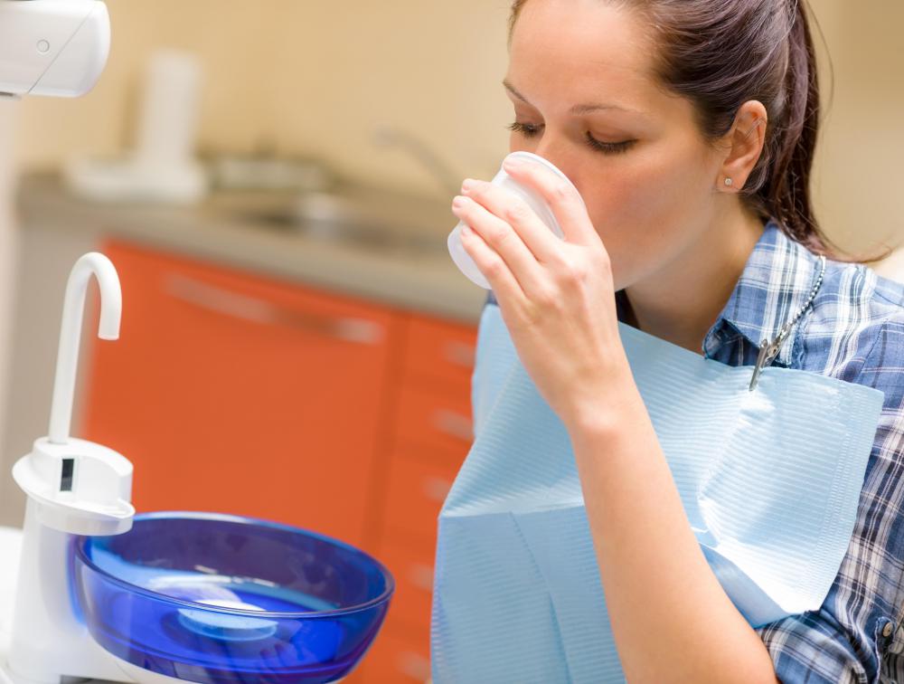 A patient may be given liquid toothpaste following a dental procedure.