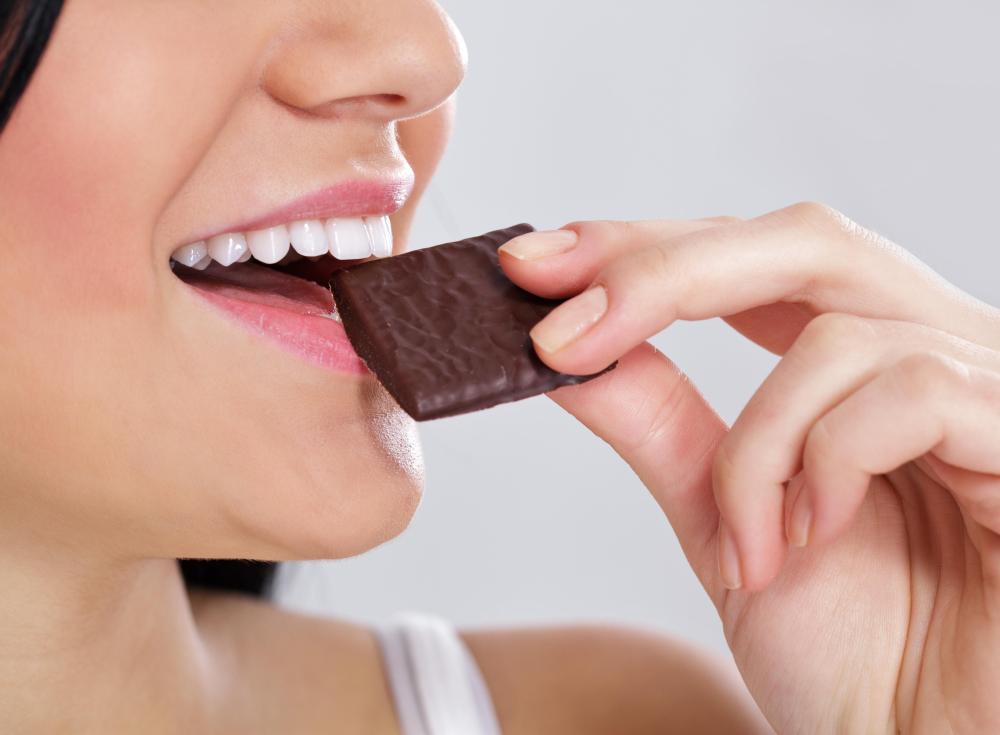Eating chocolate may cause brown vomit.