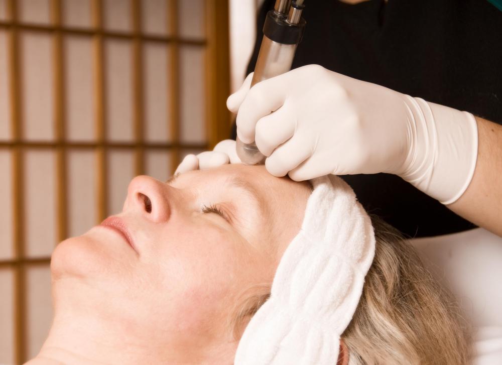 Woman having electrolysis.