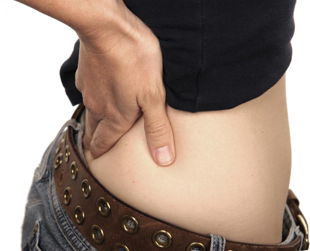Symptoms of a synovial cyst may include lower back pain.
