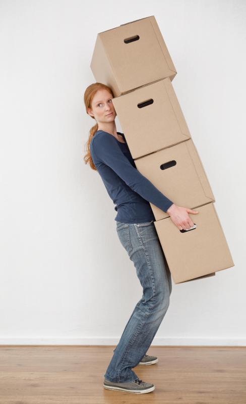 Heavy lifting can lead to muscle knots.