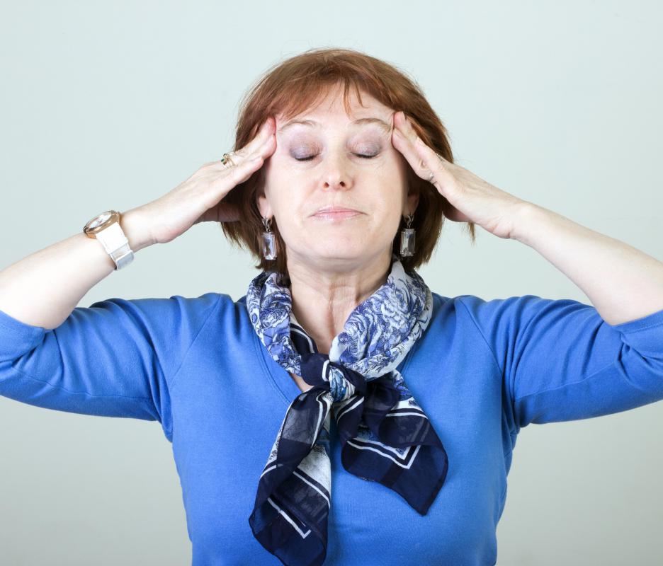 Symptoms of clonidine withdrawal may include headache.