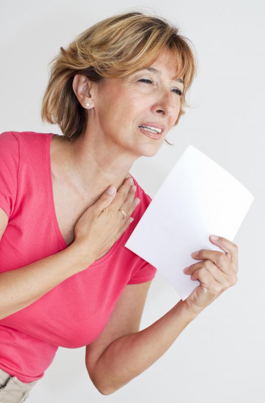 A reduction in estrogen leads to menopausal symptoms like hot flashes.