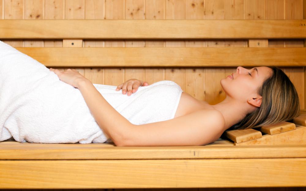 A sauna may make cellulite less noticeable because it reduces water retention.