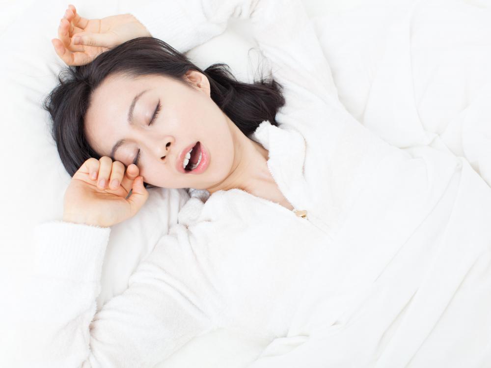 Most snoring occurs as a result of a person breathing through their mouth, rather than their nose, while sleeping.