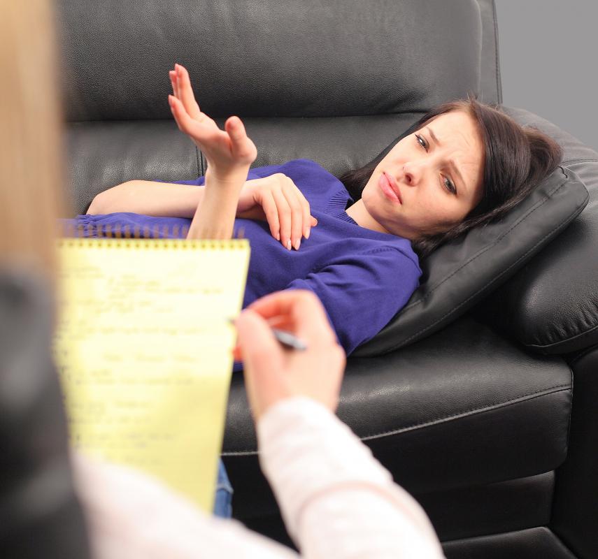 A therapist may help a patient through a traumatic situation during exposure therapy.