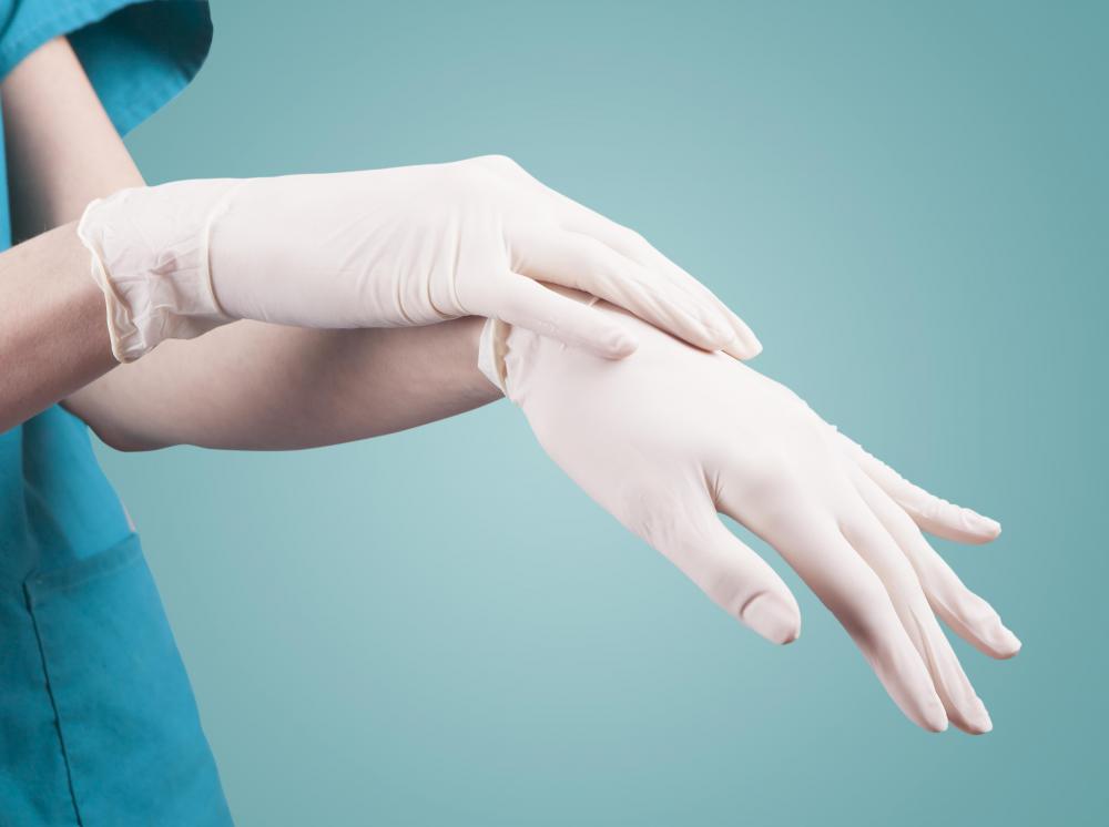 Sterile gloves may be used when touching an infected eyebrow piercing to prevent the spread of germs.