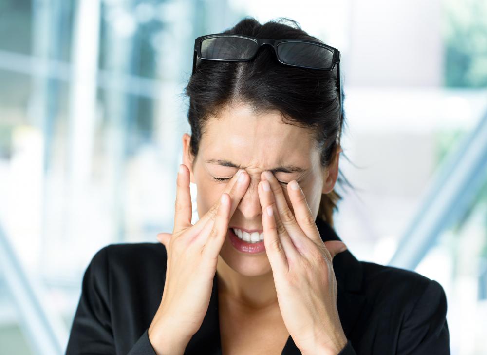 People who have difficulty adjusting to changes in light may experience headaches and eye strain.
